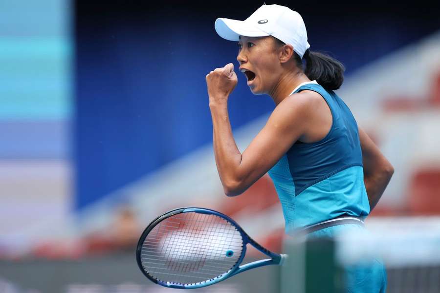 Zhang celebrates her win