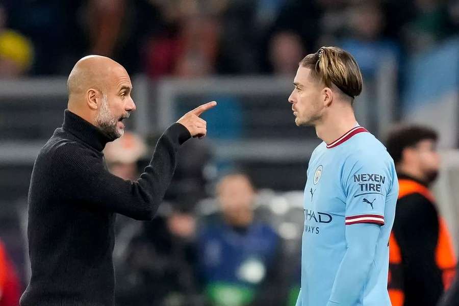 Pep Guardiola com Jack Grealish