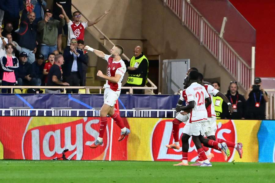 Erid Dier celebrates after scoring his penalty