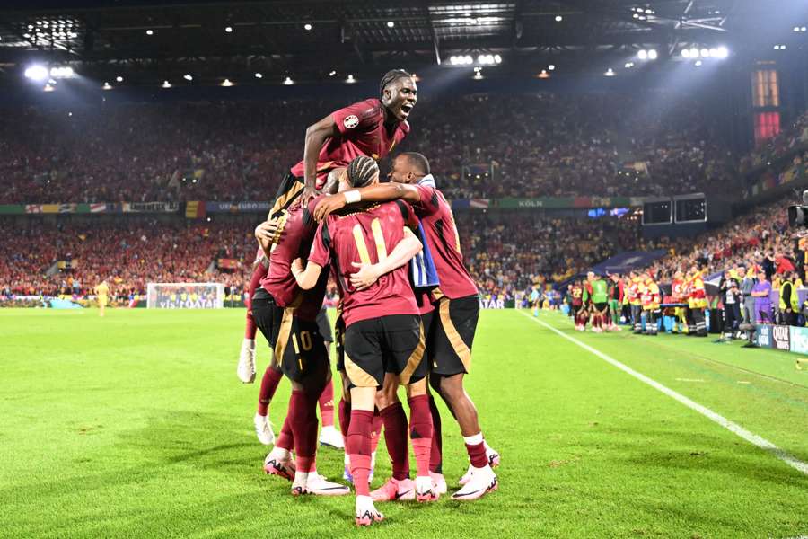 Belgium's players celebrate their second goal