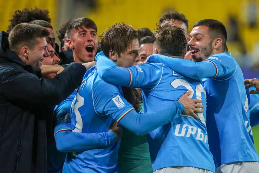 Napoli's players celebrate one of their three goals