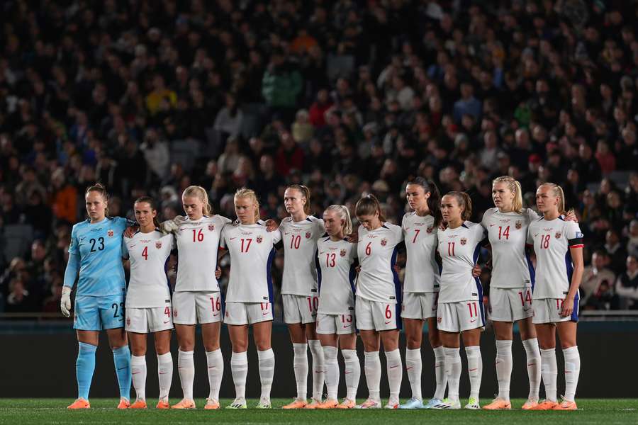 Norway players observe a minute of silence