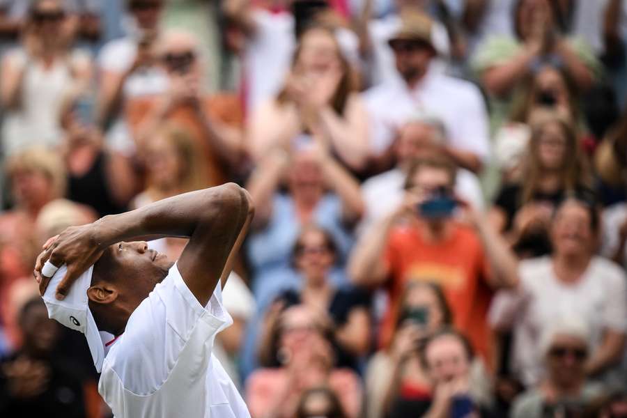 Christopher Eubanks celebrates beating Stefanos Tsitsipas