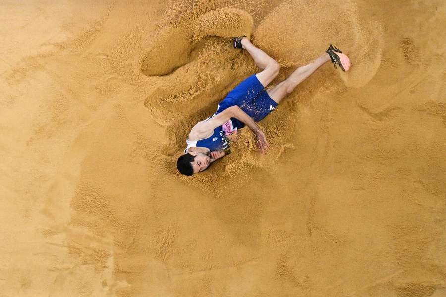 Greece's Miltiadis Tentoglou competes in the men's long jump final 