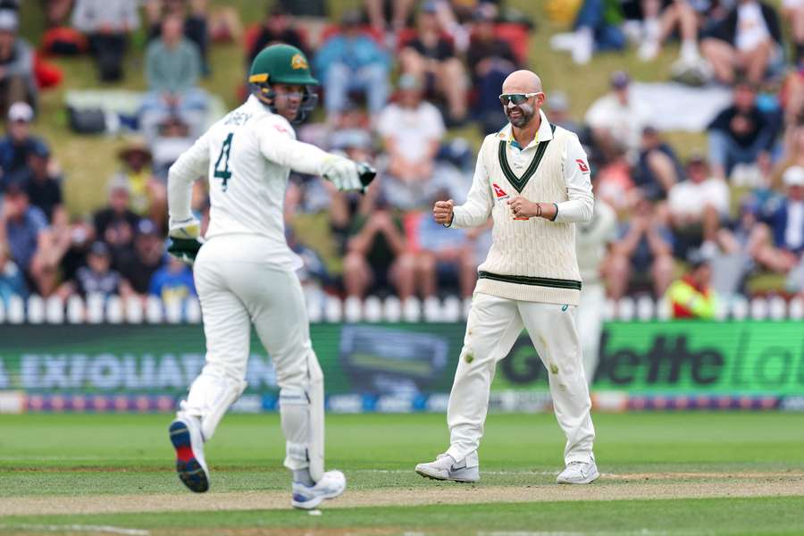 Nathan Lyon of Australia celebrates after taking the wicket of Glenn Phillips of New Zealand