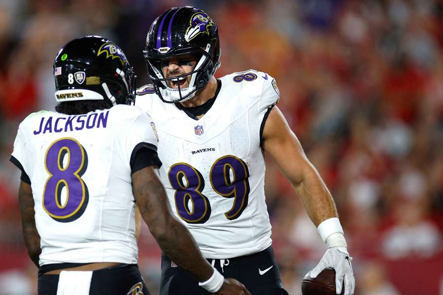  Lamar Jackson (left) AND Mark Andrews (right) celebrate a touchdown (2022)