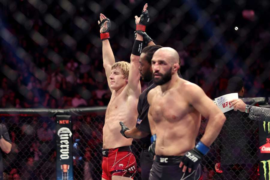 Paddy Pimblett (L) reacts after defeating Jared Gordon (R) at UFC 282 in Las Vegas