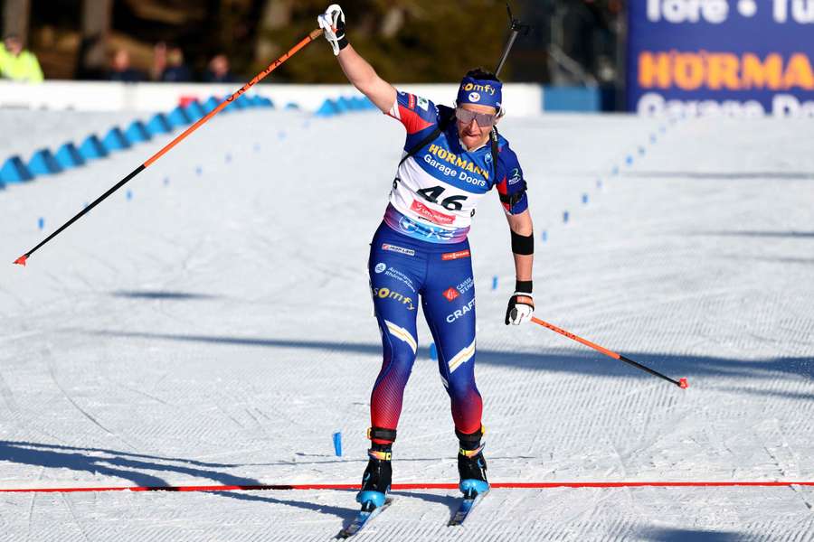 France's Julia Simon celebrates after winning the world championships