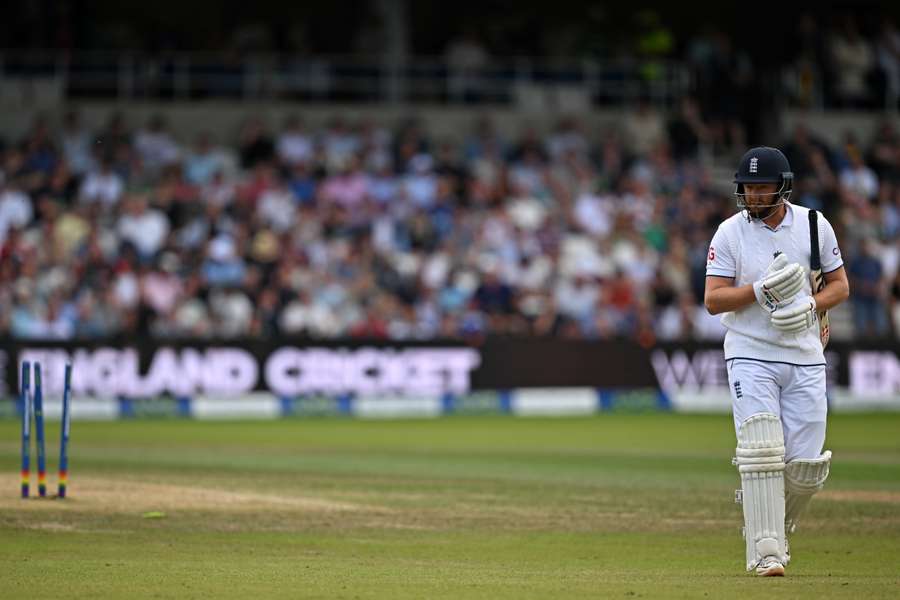 England's Jonny Bairstow reacts as he walks back to the pavilion after losing his wicket