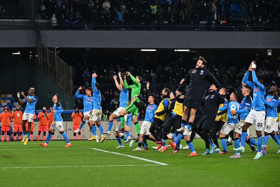 Jubilant Napoli players celebrate their 2-1 win over AS Roma