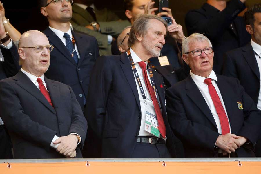 Sir Jim Ratcliffe speaking to Sir Alex Ferguson