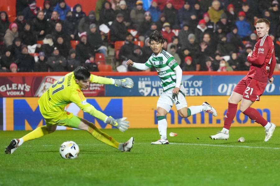 Reo Hatate scores during the William Hill SPFL match between Aberdeen FC and Celtic 