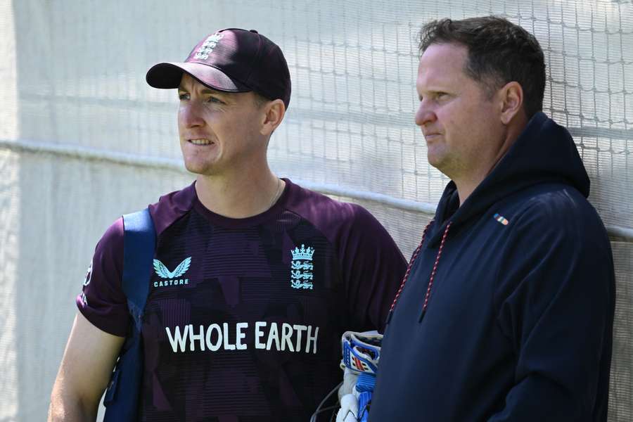 Harry Brook and Rob Key look on at England training on Sunday. Harry Brook and Rob Key look on at England training on Sunday.