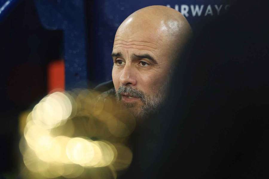 Pep Guardiola reacts during Manchester City's defeat to Tottenham