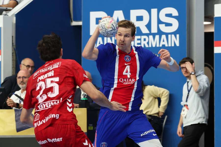 PSG's Bjarki Elisson tries to outsmart Aalborg's Marinus Munk PSG's Bjarki Elisson tries to outsmart Aalborg's Marinus Munk