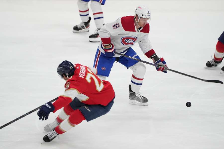 Canadiens' Matheson moves the puck around Panthers' Verhaeghe