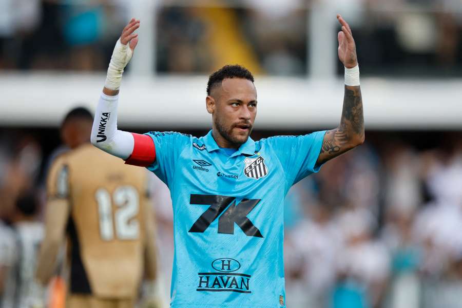 Neymar reacts during a match between Santos and Botafogo 