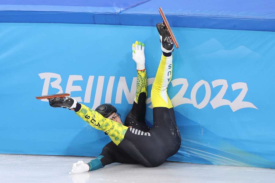 Brendan Corey crashes out of the 1000m short track speed skating event at the 2022 Winter Olympics in Beijing. 