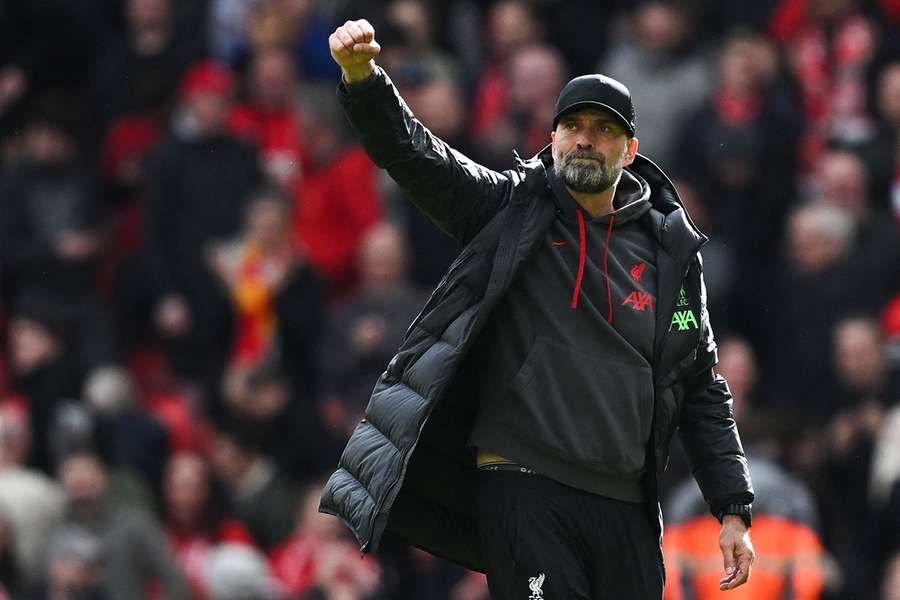 Klopp gestures to the Anfield crowd