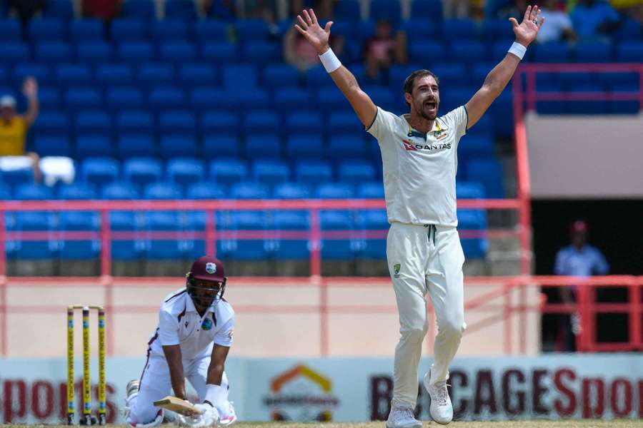 Mitchell Starc appeals for LBW against West Indies captain Roston Chase during the second Test in Grenada.