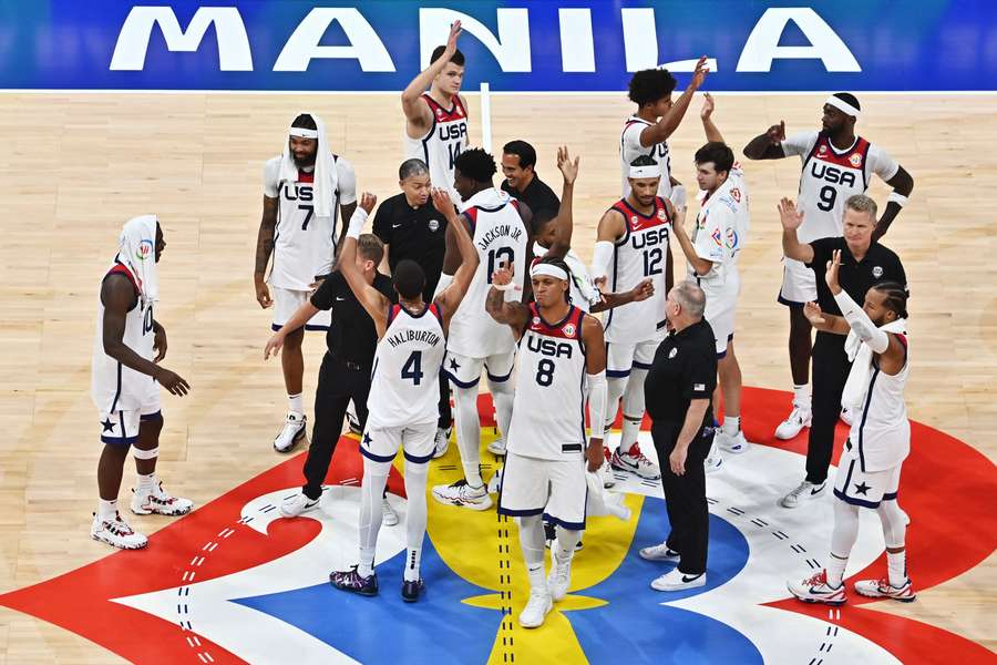 Team USA celebrate a win in the group stage of the World Championship