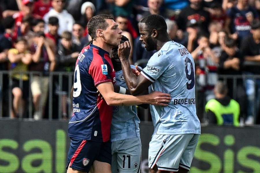 Udinese's Keinan Davis was pictured in a heated discussion with Cagliari's Gianluca Gaetano