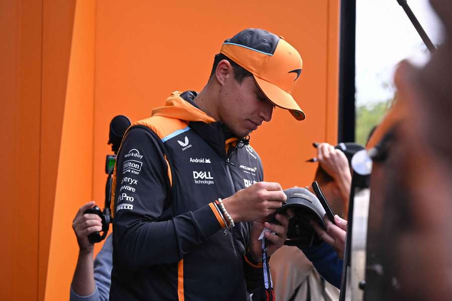 Norris signs autographs at the Belgian GP