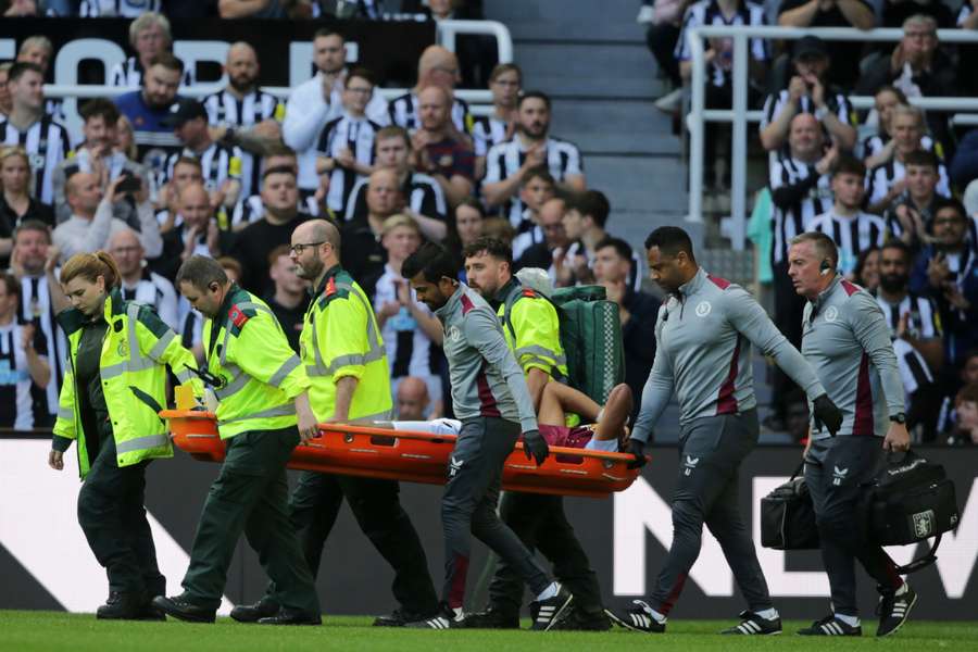 Tyrone Mings was stretchered off during Villa's defeat to Newcastle