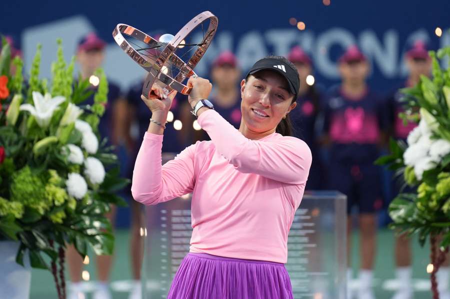 Jessica Pegula of the United States celebrates with her trophy