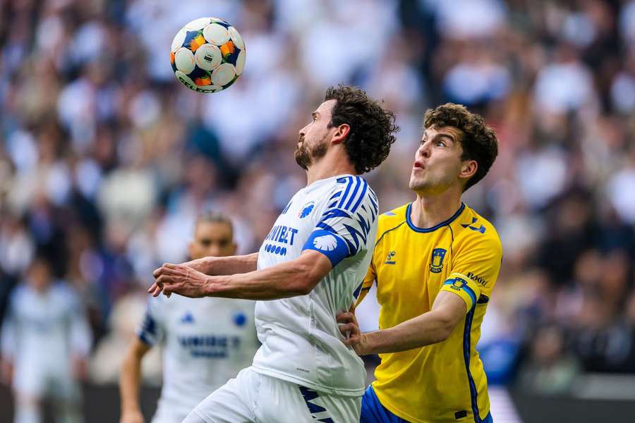 Thomas Delany and Jacob Rasmussen battle for the ball