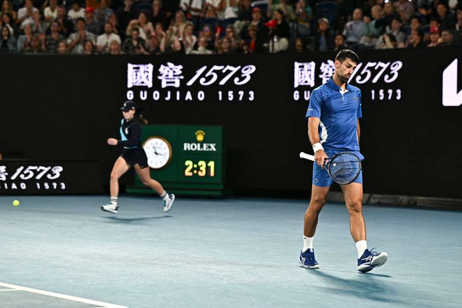 Serbia's Novak Djokovic reacts on a point against Australia's Alexei Popyrin