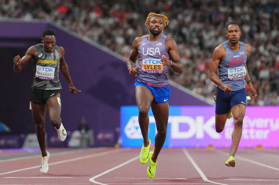 Noah Lyles crosses the line