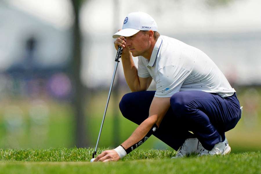 Spieth said he suffered the injury when he pushed himself off the ground while playing with his son