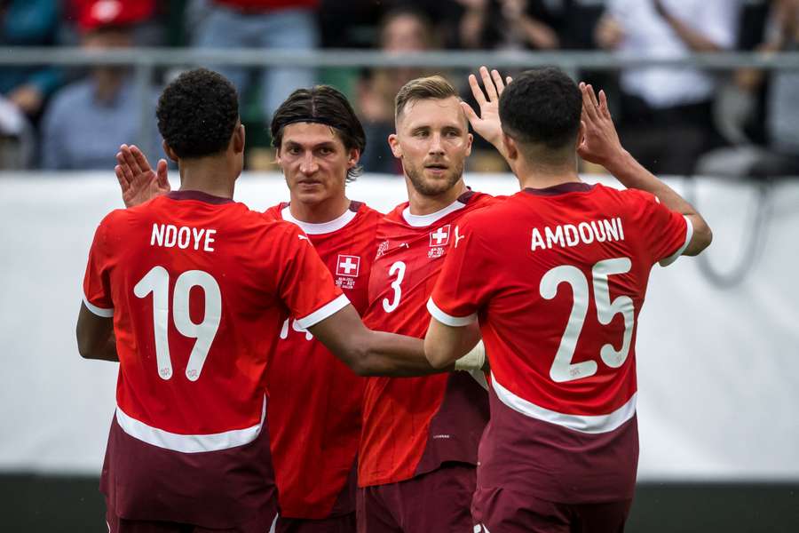 Switzerland's Silvan Widmer celebrates after scoring