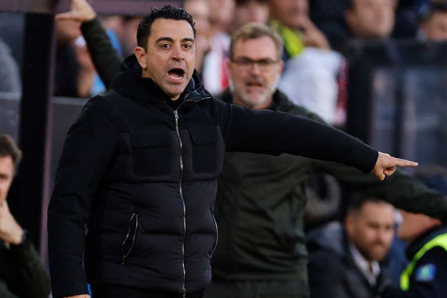 Xavi gestures from the dugout as Barcelona are held by Rayo Vallecano