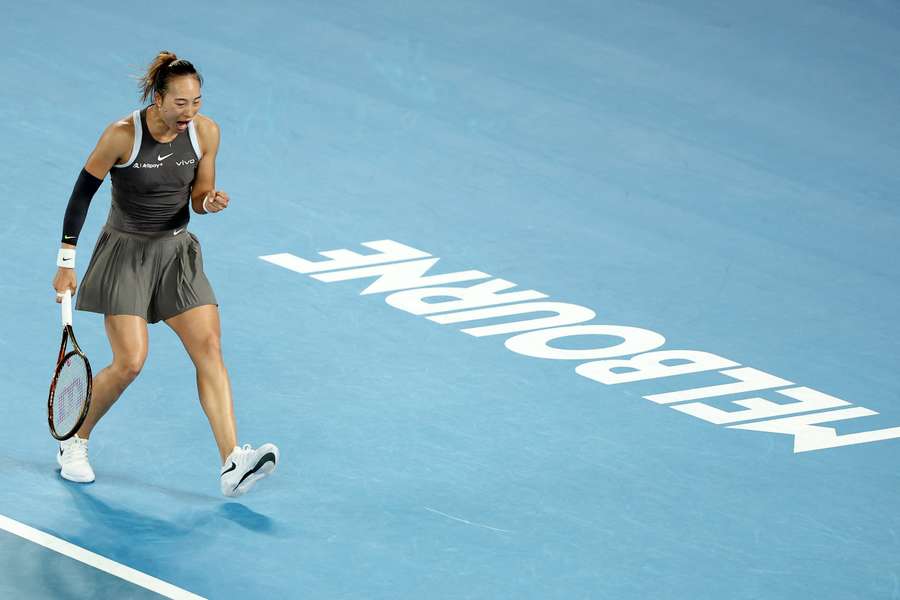 Zheng celebrates her win at the Australian Open