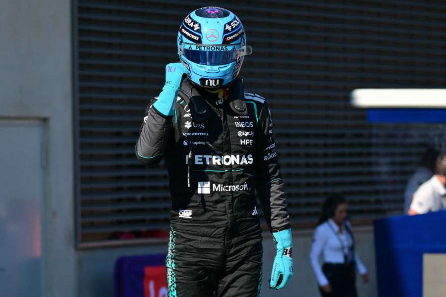 George Russell celebrates after securing pole position George Russell celebrates after securing pole position