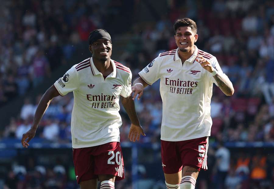 Arsenal's Noni Madueke celebrates scoring their second goal with Piero Hincapie