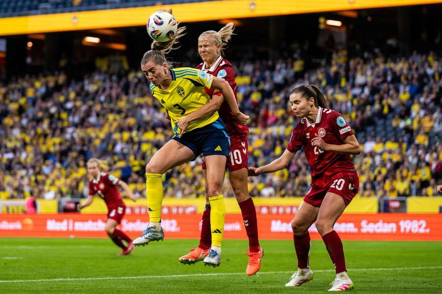 Sweden's Linda Sembrant competes for the ball with Pernille Harder and Signe Bruun during the Nations League clash