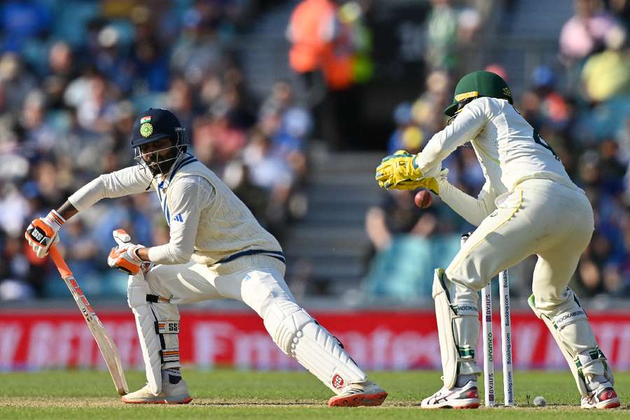 Jadeja watches as he edges behind