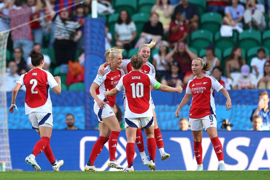 Stina Blackstenius of Arsenal celebrates scoring her team's first goal with teammates