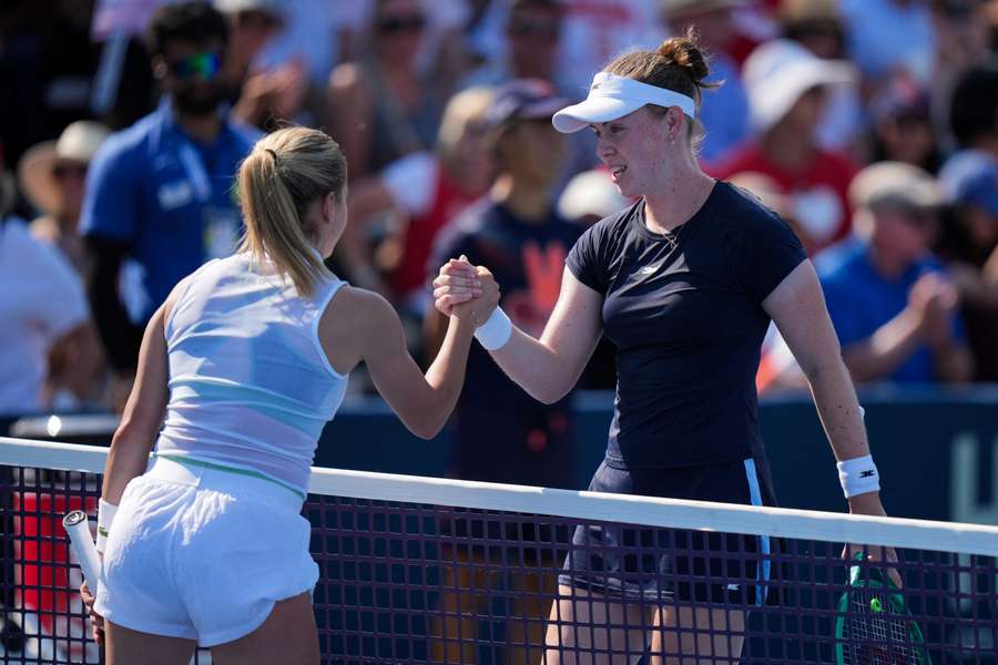 Chwalinska (left) shakes hands with Gibson at the net Chwalinska (left) shakes hands with Gibson at the net