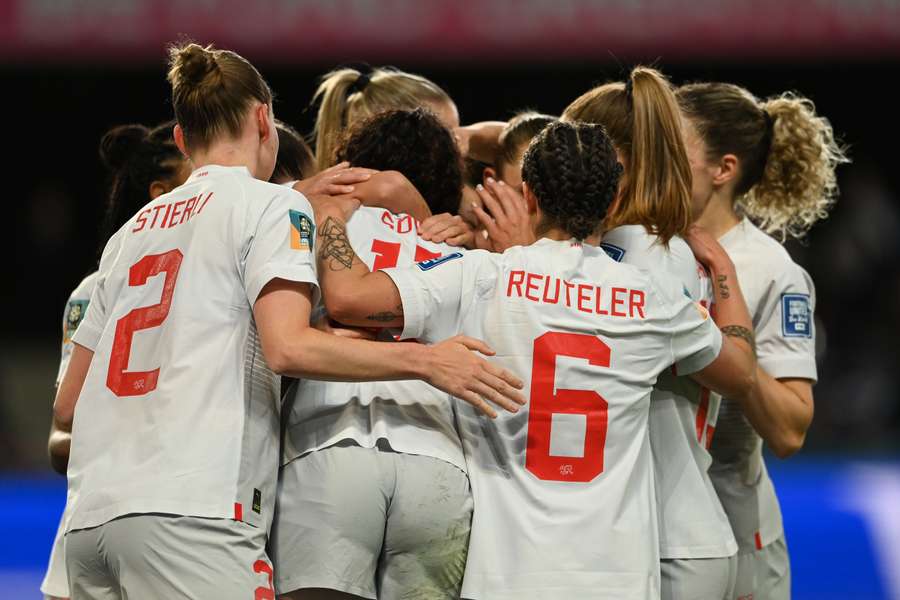 Switzerland's players celebrate their win