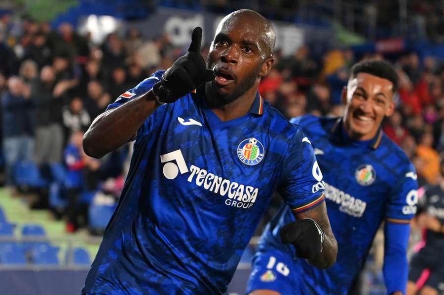 Allan Nyom celebrates the team's second goal with teammate Alvaro Rodriguez