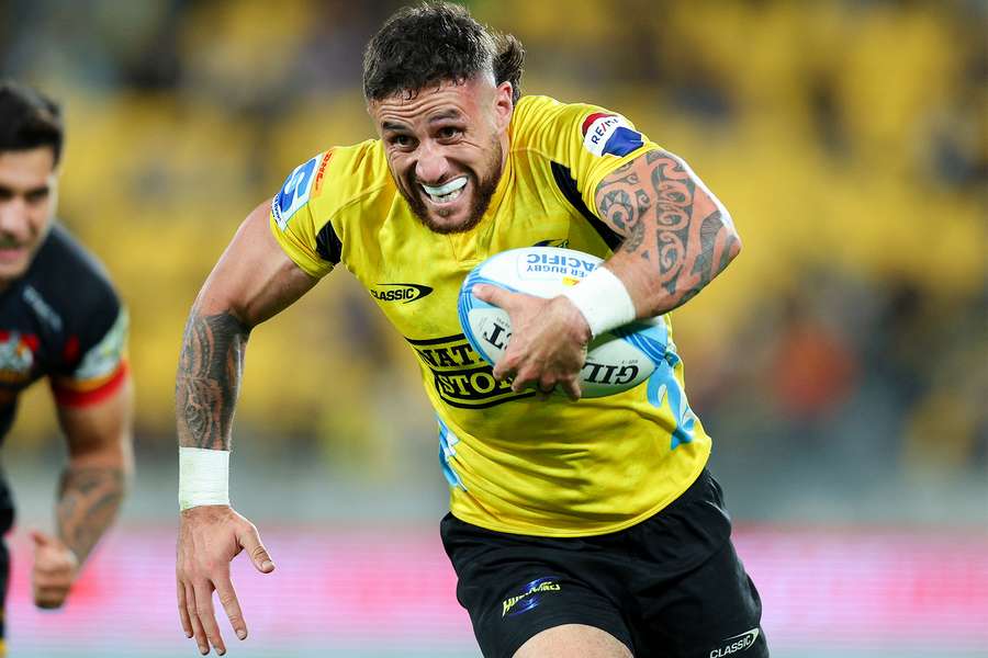 TJ Perenara drew level with former Hurricanes team-mate Julian Savea with his two tries