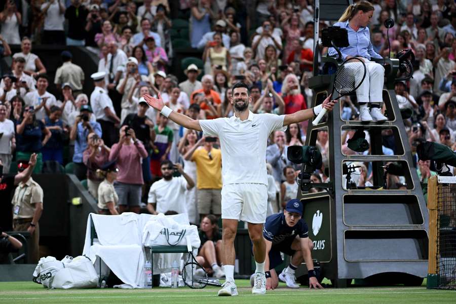 Djokovic celebrates his epic win Djokovic celebrates his epic win