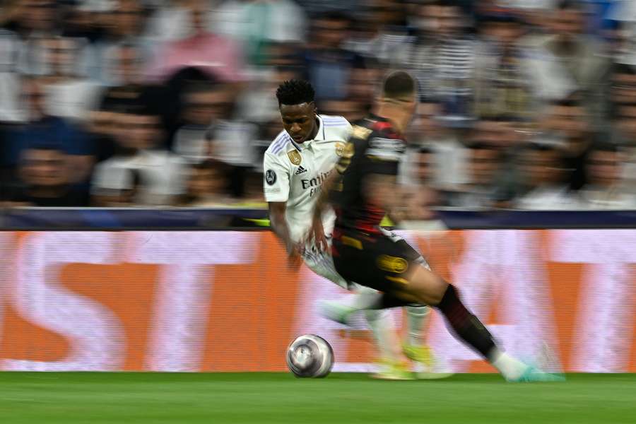 Vinicius Junior tries to get past Kyle Walker Vinicius Junior tries to get past Kyle Walker