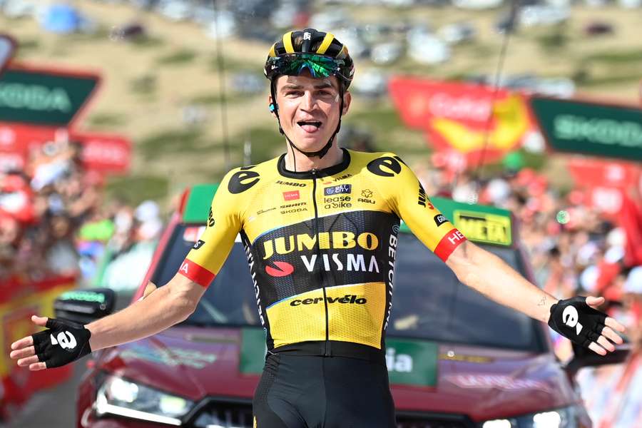 Team Jumbo-Visma's Sepp Kuss slapped hands with spectators as he celebrated winning the sixth stage of La Vuelta
