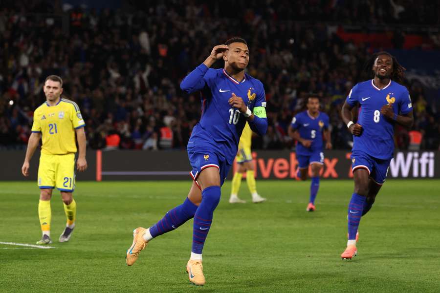 Kylian Mbappe celebrates