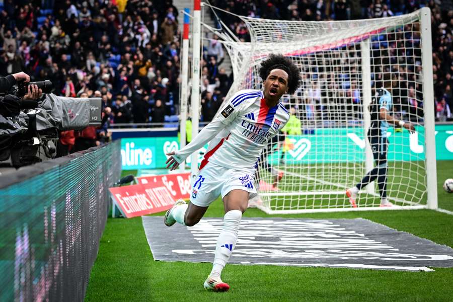 Lyon’s Belgium forward Malick Fofana celebrates after scoring against Le Havre